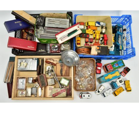 THREE TRAYS OF MISCELLANEOUS ITEMS, to include a tray of pens and desk top equipment, such as a cased silver tone ball point 