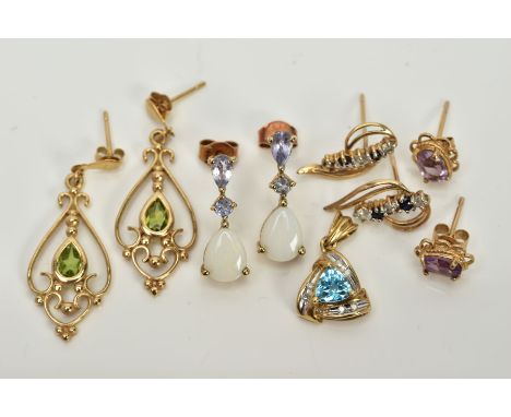 FOUR PAIRS OF YELLOW METAL EARRINGS AND A PENDANT, to include a pair of openwork scroll detailed scroll earrings set with pea