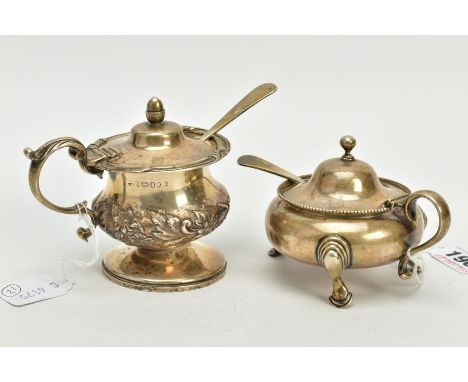 VICTORIAN AND GEORGIAN SILVER MUSTARD POTS, the Victorian mustard of circular form, domed hinged cover above a beaded rim, wi