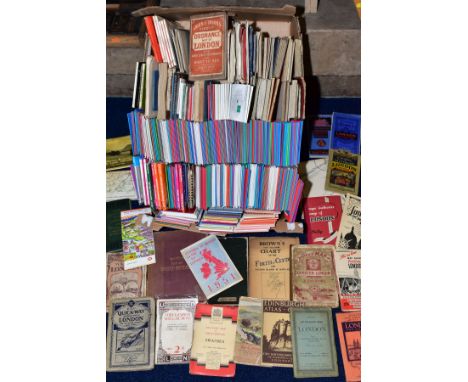 A BOX OF FOLDED MAPS, including Bacon's Map of Great Britain, Ordnance Survey, Philips, London bus and rail maps, time tables