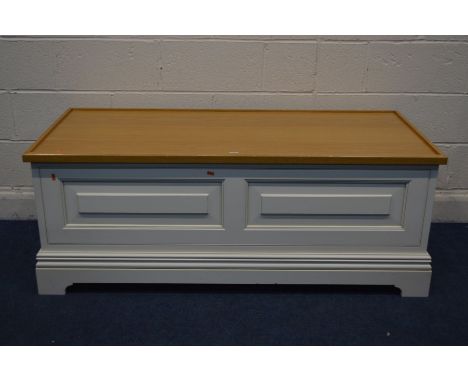 A MODERN LIGHT OAK AND CREAM PAINTED BLANKET CHEST, width 144cm x depth 65cm x height 55cm (s.d)