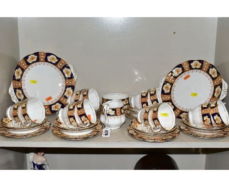 A ROYAL ALBERT 'HERITAGE PATTERN' TEA SET, comprising a pair of bread and butter plates, milk jug, sugar bowl, twelve tea cup