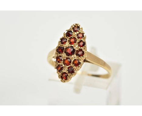 A 9CT GOLD GARNET RING, of a lozenge design set with fifteen circular cut garnets, plain polished band, hallmarked 9ct gold B