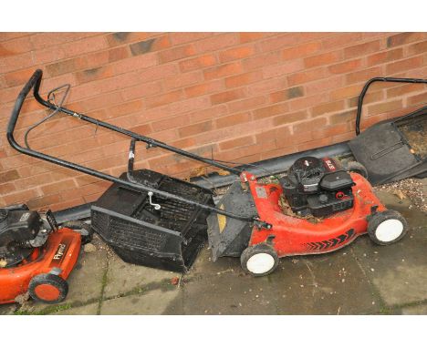A SOVEREIGN PETROL LAWN MOWER with grass box (engine pulls freely but hasn't been started)