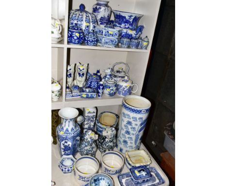 A QUANTITY OF MODERN BLUE AND WHITE CERAMICS, including Oriental vases, stick stand, jars and covers, animal figures, bowls, 