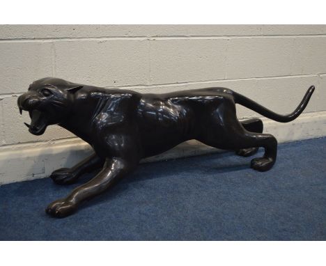 A BRONZE BLACK PANTHER SCULPTURE, length 159cm x height 49cm