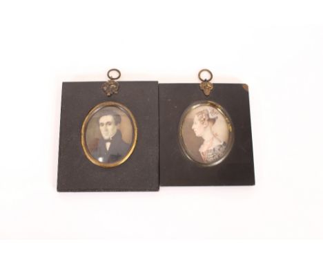 19th Century school, portrait study of a lady wearing pearls and ribbons in ebonised brass mounted frame; and another of gent