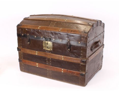 A Victorian domed top trunk, with metal mounts and brass lock plate, 71cm wide