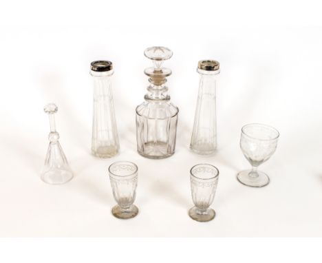 A Victorian ring neck decanter; an etched glass rummer; pair of smaller glasses; a pair of silver mounted glass spill vases e