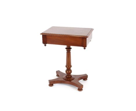 A Victorian mahogany side table, the rectangular top fitted blind frieze drawer raised on a turned baluster column and quatre