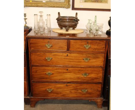 A Georgian mahogany chest, with two short and three long drawers, raised on bracket feet, 106cm wide