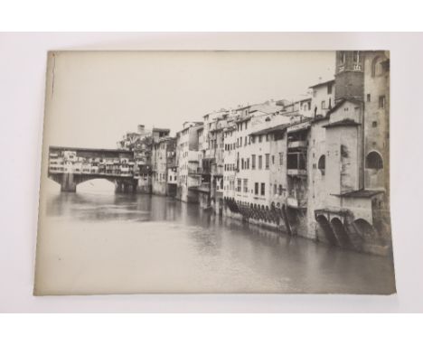 A folder containing various unframed photographs, of Florence, Venice; and some post-cards