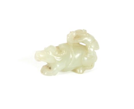 A 19th Century Chinese carved jade miniature figure, of a boy riding a buffalo, 4.5cm long