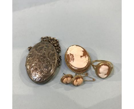 A 9ct gold, mounted cameo ring, brooch and earrings and a silver locket