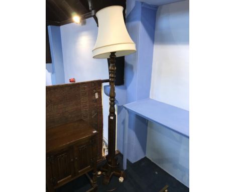 An Old Charm oak standard lamp