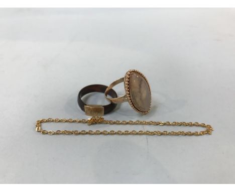 A 9ct? yellow metal ring, marks rubbed, 5.4g, an antique tortoise shell ring etc.