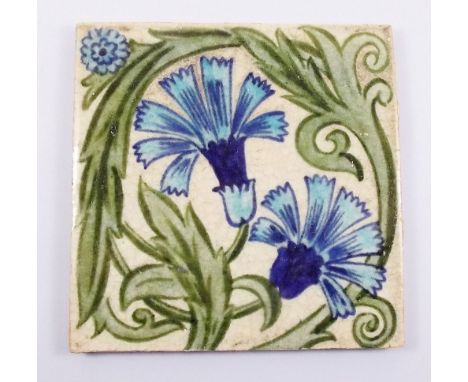 A William de Morgan tile painted blue "Carnation", impressed mark to verso