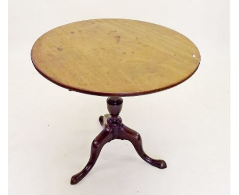 A Georgian mahogany circular tilt top occasional table on column and tripod support 