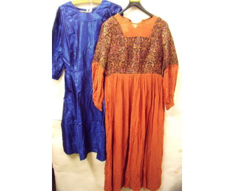 A vintage blue metallic dress and a red crepe georgette dress 