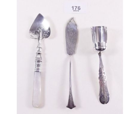 A silver ham spade with mother of pearl handle Birmingham 1919, with Dutch silver caddy spoon and a butter knife