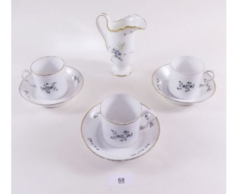 Three French 19th century coffee cans and saucers and a milk jug 