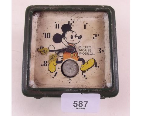 An Ingersoll 'Mickey Mouse' alarm clock in need of repair 