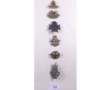 A selection of Rhodesian army cap badges 