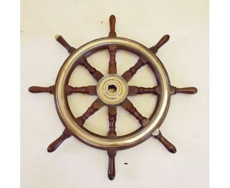 An Admiralty brass mounted ships wheel with MOD arrow and "RC"