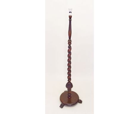 A  mahogany spiral twist standard lamp