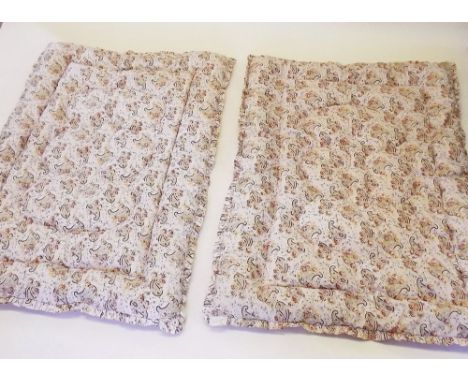 A pair of single floral vintage eiderdowns