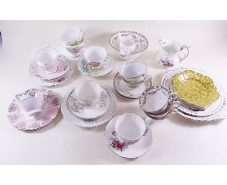 Various decorative vintage tea ware including: twelve cups, nine saucers, eleven tea plates, two milk jugs, 1 sugar bowl and 