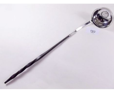 A white metal and horn handled Georgian punch ladle, inset coin 