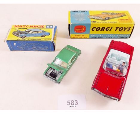 A Corgi Chrysler car  Imperial No 246, complete  with two figures and golf clubs, boxed and a Matchbox Ford Zodiac 53, box a/