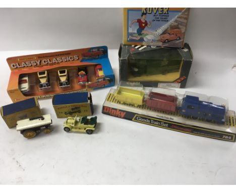 A collection of boxed model vehicles including Matchbox, Corgi, Dinky, And Models of Yesteryear.