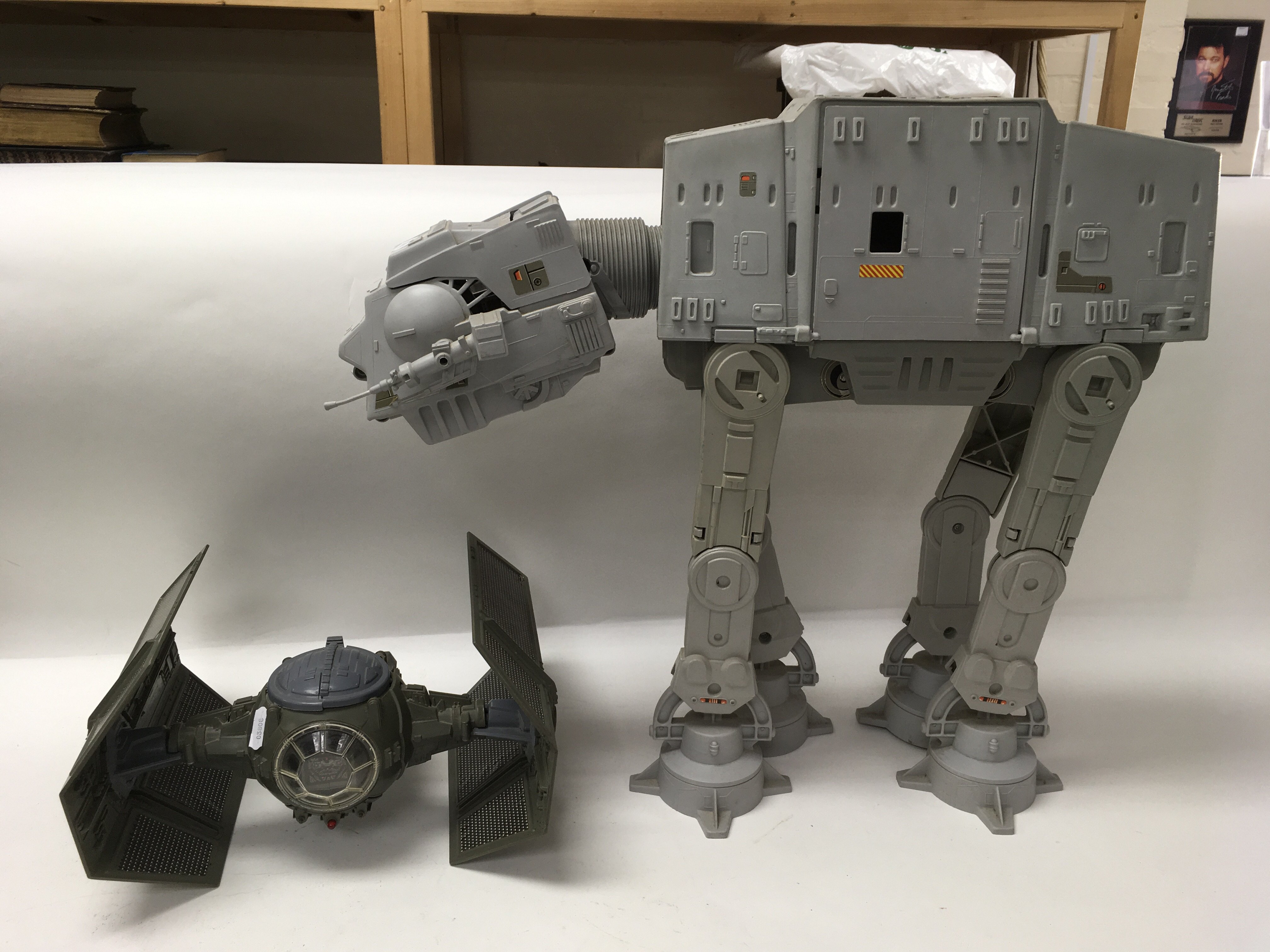 A collection of vintage Star Wars vehicles including an ATAT Walker, a boxed Return of The Jedi