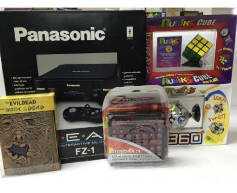 A boxed Panasonic REAL interactive multiplayer FZ-1 together with a boxed Doom 3 keyset for Z board, Nintendo 64 controller, 