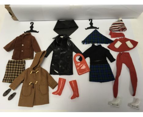 A bag containing  vintage original lablelled Sindy clothing including full outfits, plus other similar clothing