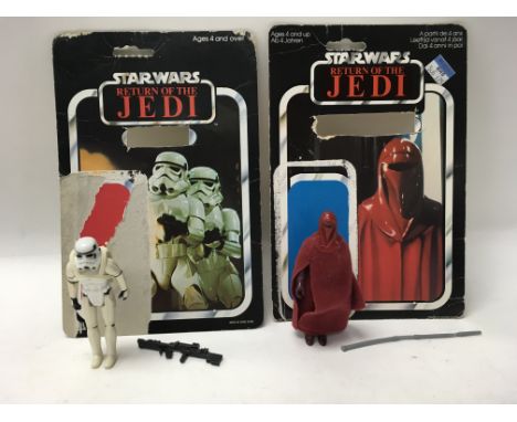 A collection of vintage Star Wars: Return of The Jedi figures including Darth Vader, a Storm Trooper & an Emperors Royal Guar