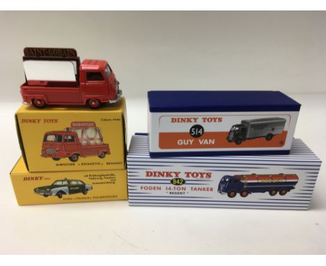 A Collection of 4 boxed Dinky Toys by Atlas including Regent Tanker (No. 942), Guy van; Slumberland (No. 514), a Ford Taunus 