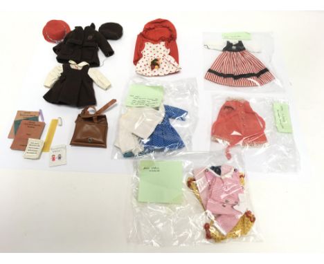 A small collection of original Patch doll clothing comprising  five complete outfits including a school uniform set