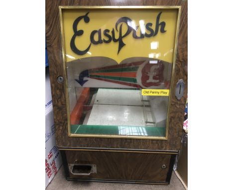 An old penny Easy Push slot machine