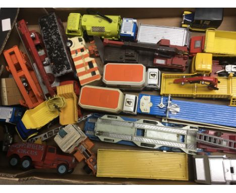 A collection of unboxed Corgi and Dinky model vehicles including fire engines, lorries, dust carts, chipper fields crane, sec