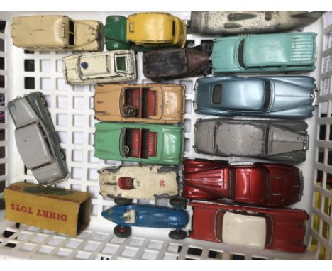 A collection of unboxed Dinky Toys cars , taxis, ambulances, racing cars etc .