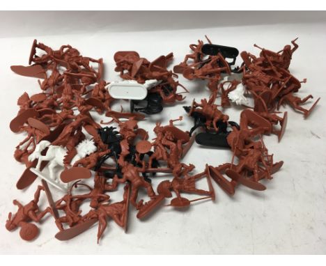 A collection of unboxed plastic soldiers in 3 tubs together with 2 unboxed Dinky toy tanks and a Corgi tank.