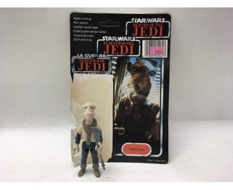 A vintage Star Wars: Return of The Jedi Yak Face figure with weapon and original card back.