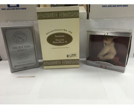 A collection of 3 boxed Steiff bears.