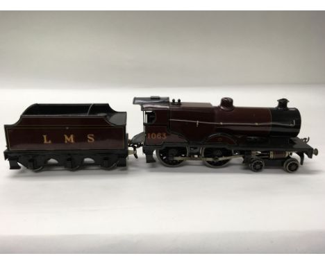 A Bassett-Lowke electronic compound engine train and tender in Burgundy colour ‘O’ gauge.