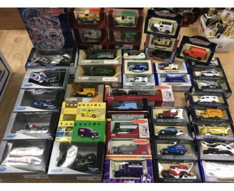 A box containing boxed model vehicles including Vanguards, Matchbox Models of Yesteryear, Oxford Diecast, Matchbox, Corgi Cla