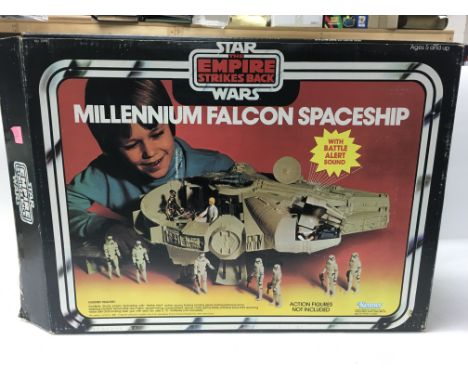 A boxed vintage Star Wars: The Empire Strikes Back Millenium Falcon with instructions.