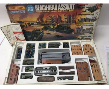 A boxed Matchbox beach head assault playset ,a boxed Matchbox railway goods yard play set and 2 boxed subbuteo sets